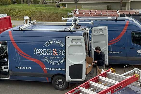 about Pope & Sons;  technician loading service truck